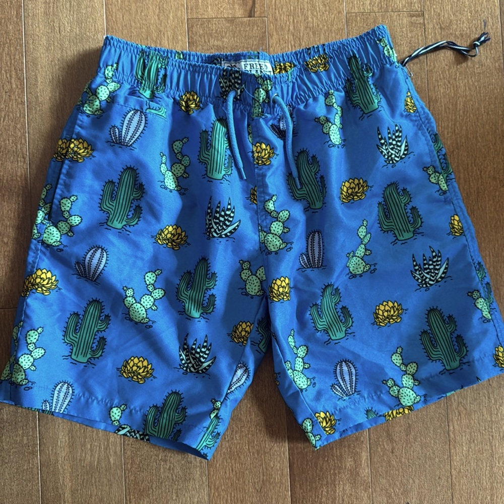 Boy’s swim wear, size 14, brand “Free Planet”.